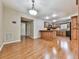 Charming kitchen with wooden cabinets, breakfast bar, and laminate flooring at 283 Harmony Lake Dr, Canton, GA 30115