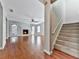 Cozy living room with a fireplace and hardwood floors, great for entertaining guests at 283 Harmony Lake Dr, Canton, GA 30115