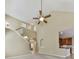 Spacious living room features a stairway to the second floor and vaulted ceiling with a ceiling fan at 283 Harmony Lake Dr, Canton, GA 30115