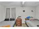 Bedroom featuring neutral walls, patterned carpet, two beds, and three-drawer night stand at 3109 Meadow Wood Ct, Lawrenceville, GA 30044