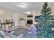 Open living room features modern colors, and partial view into kitchen at 3109 Meadow Wood Ct, Lawrenceville, GA 30044