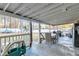 Covered patio with white beamed ceiling and view of playground at 3109 Meadow Wood Ct, Lawrenceville, GA 30044