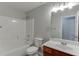 Bathroom with a combined shower and tub unit, and a vanity with a sink at 2341 Walnut Tree Ct, Buford, GA 30519