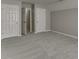 Spacious bedroom with plush carpet, neutral walls, and ample natural light at 2341 Walnut Tree Ct, Buford, GA 30519