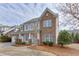 Charming two-story home featuring a two-car garage, brick accents and a welcoming front porch at 2341 Walnut Tree Ct, Buford, GA 30519