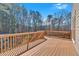 Enjoy outdoor living on this spacious wooden deck, perfect for entertaining and overlooking a private, wooded backyard at 79 Nimblewood Trl, Acworth, GA 30101