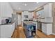 Bright, modern kitchen with white cabinetry, stainless steel appliances, and a center island at 79 Nimblewood Trl, Acworth, GA 30101