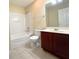 Bathroom featuring a tub-shower combination, toilet and vanity at 2098 Cutleaf Creek Rd, Grayson, GA 30017