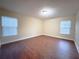 Spacious room with hardwood floors and natural lighting at 2098 Cutleaf Creek Rd, Grayson, GA 30017