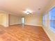 Bright living room featuring hardwood floors and large windows with natural light at 2098 Cutleaf Creek Rd, Grayson, GA 30017