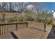 Wooden deck providing scenic views of backyard, perfect for relaxation at 2121 Lindley Nw Ln, Kennesaw, GA 30144