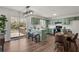 Inviting kitchen with modern green cabinetry, stainless steel appliances, and an adjacent dining area at 2121 Lindley Nw Ln, Kennesaw, GA 30144