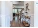 Inviting foyer with hardwood floors, decorative accents, and a view of the living space at 123 Maplewood Ln, Conyers, GA 30094