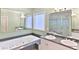 Luxurious bathroom featuring a soaking tub, double vanity, and glass-enclosed shower at 1230 Mars Hill Nw Rd, Acworth, GA 30101