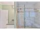 This bathroom features a glass shower with double showerheads and mosaic tile accents at 1230 Mars Hill Nw Rd, Acworth, GA 30101