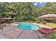 Inviting backyard swimming pool, perfect for outdoor entertaining and relaxation at 1230 Mars Hill Nw Rd, Acworth, GA 30101