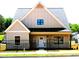 Charming home with a well-manicured lawn and inviting front entrance at 133 Old Alabama Se Rd, Emerson, GA 30137