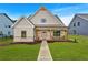 Charming craftsman-style home with a well-manicured lawn and inviting front porch at 133 Old Alabama Se Rd, Emerson, GA 30137