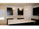 Modern kitchen with sleek black cabinets, white countertops, and stylish pendant lighting at 133 Old Alabama Se Rd, Emerson, GA 30137