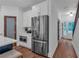 Bright kitchen area featuring stainless steel refrigerator and hardwood floors at 133 Old Alabama Se Rd, Emerson, GA 30137