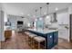 Open-concept kitchen features a large island, white cabinets, and stainless steel appliances at 133 Old Alabama Se Rd, Emerson, GA 30137