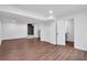 Spacious basement area with wood-look floors, recessed lighting, and white-painted walls at 3046 Wendgate Dr, Marietta, GA 30062