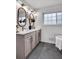 Bathroom with double vanity, modern mirrors, and stylish fixtures at 3046 Wendgate Dr, Marietta, GA 30062