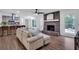 Cozy living area with a stone fireplace, hardwood floors, and comfortable seating at 3046 Wendgate Dr, Marietta, GA 30062