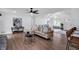 Bright, open living room featuring vaulted ceilings, wood floors, and modern furnishings at 3046 Wendgate Dr, Marietta, GA 30062