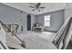 Bedroom with a ceiling fan and natural light, showing signs of renovation, with potential at 1010 Martin Ln, Canton, GA 30114