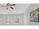 Airy bedroom with a ceiling fan, two windows, and decor at 1795 Waterside Nw Dr, Kennesaw, GA 30152