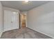 Bedroom with carpet, neutral walls, and closet at 1797 Old Dogwood, Jonesboro, GA 30238