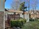 Backyard with an elevated deck, steps, and mature landscaping and foliage at 1920 Anastasia Ln, Atlanta, GA 30341