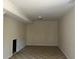 Spacious basement area with neutral paint, crown moulding and tiled floor at 1920 Anastasia Ln, Atlanta, GA 30341