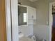 Bathroom with vanity sink, tile backsplash and medicine cabinet at 1920 Anastasia Ln, Atlanta, GA 30341