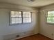 Bedroom featuring hardwood floors and natural light from the window at 1920 Anastasia Ln, Atlanta, GA 30341