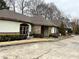 Charming single-story home with stone accents and a well-manicured front yard at 1920 Anastasia Ln, Atlanta, GA 30341