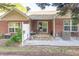 Inviting backyard patio with seating, grill, and white gravel landscaping at 233 Tara Commons Walk, Loganville, GA 30052