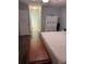 Bedroom with hardwood floors and light blue walls at 233 Tara Commons Walk, Loganville, GA 30052