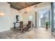 Charming dining area with modern table, stylish chairs, and floor-to-ceiling windows at 3324 Peachtree Ne Rd # 2118, Atlanta, GA 30326