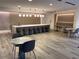 Kitchen area with counter seating, modern light fixtures, and stylish dining options at 3324 Peachtree Ne Rd # 2118, Atlanta, GA 30326