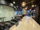 Spacious lounge with a bar area, modern furniture, and large windows with views of the surrounding landscape at 3324 Peachtree Ne Rd # 2118, Atlanta, GA 30326
