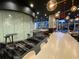 Stylish lounge with bar area, modern furniture, and large windows providing ample natural light and city views at 3324 Peachtree Ne Rd # 2118, Atlanta, GA 30326