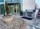 Outdoor area featuring a built-in stainless steel grill and stone ground surface at 3324 Peachtree Ne Rd # 2118, Atlanta, GA 30326