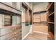 Spacious walk-in closet with custom shelving and drawers at 3324 Peachtree Ne Rd # 2118, Atlanta, GA 30326