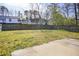 Large backyard with a fence and patio, great for entertaining and outdoor enjoyment at 6929 Hickory Log Rd, Austell, GA 30168