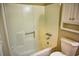Bathroom featuring a shower-tub combo, toilet, and white walls at 6929 Hickory Log Rd, Austell, GA 30168