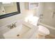 Bathroom featuring a single vanity, a modern faucet, and a toilet near a shower at 6929 Hickory Log Rd, Austell, GA 30168