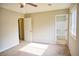 Bright bedroom with carpet flooring, and access to an en-suite bathroom at 6929 Hickory Log Rd, Austell, GA 30168