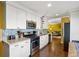 Bright kitchen features stainless steel appliances, granite countertops, and white cabinets at 3351 Creatwood Se Trl, Smyrna, GA 30080